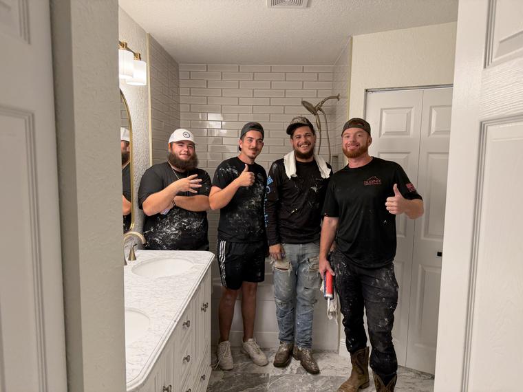 The Diligence crew in a bathroom they just finished