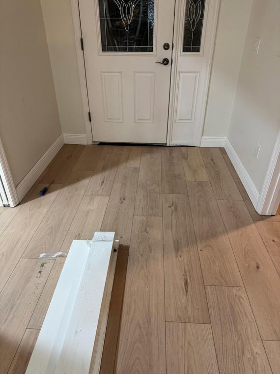 Plank flooring detail at the entry threshold