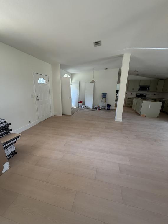 The entry and main living room, looking back toward the front door