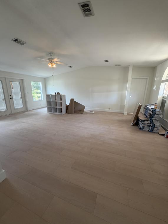 Living room with french doors out to the lanai