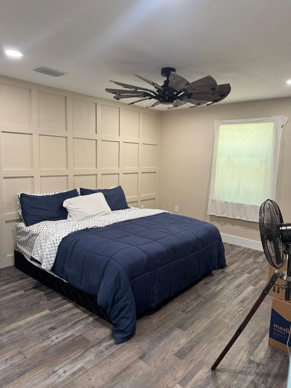 Board-and-batten accent wall with new flooring