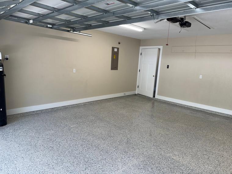Garage floor finished with a sealed concrete coating